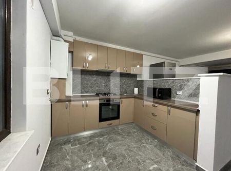 Apartament modern cu două camere, centrala si loc de parcare privat - Fotografie 5