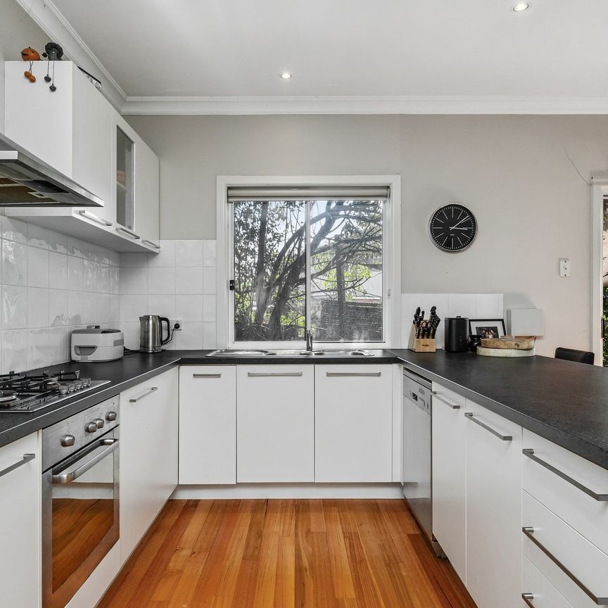 Three bedroom home in a great location - 6 Month lease - Photo 1