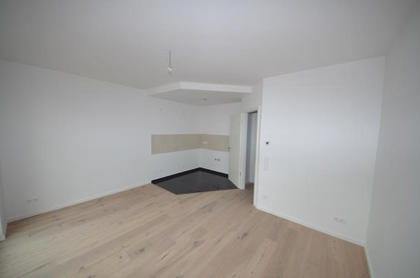 Erstbezug – Erdgeschoss-Wohnung mit Terrasse und Garten ! - Photo 1