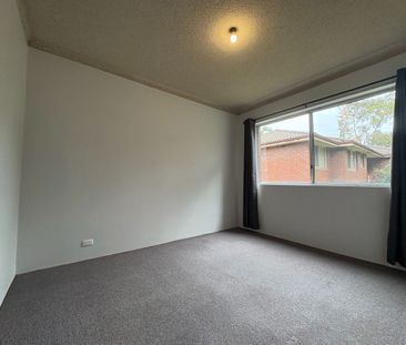 2 bedroom unit with secured garage - Photo 2