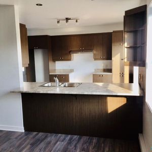 Grand condo 2 chambres WIFI - Parking - Locker - balayeuse central - échangeur air - Photo 2