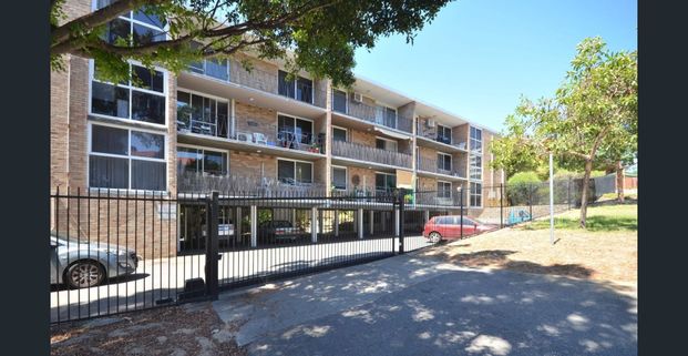 Top -Floor One-Bedroom Unit - Available Now - Photo 1