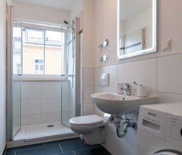 Wölfnitz - helle 1-Zimmer-Wohnung mit Einbauküche, Westbalkon und T... - Foto 3