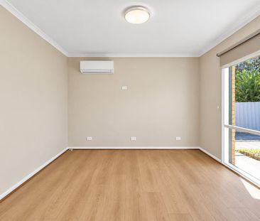 Enjoy Comfortable Living in This Well-Presented Home - Photo 1
