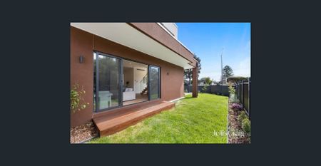 Big, bright and designed for easy family living with access from Schulz Street. - Photo 5