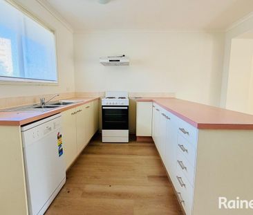 Renovated, Stylish, & Low-Maintenance Living in Prime Location - Photo 6