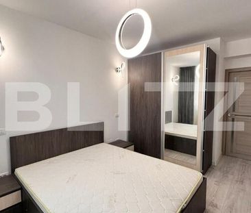 Apartament de 2 camere, decomandat, modern, zona Calea Bucuresti - Photo 2