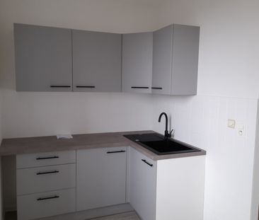 T2 47.54 m²- MONTAGNY - Photo 2
