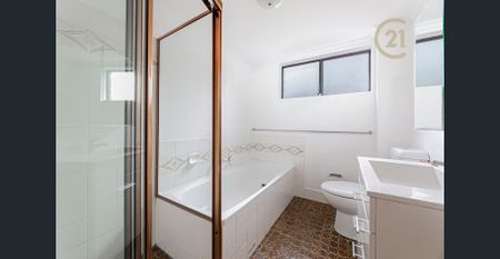 Neat and Spacious 2-Bedroom Apartment for rent! - Photo 2