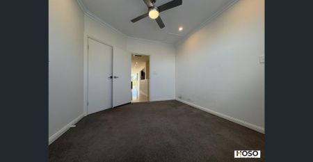 Luxury 4-Bedroom Home with Large Solar & Battery System in Prime Mawson Lakes Location - Photo 4