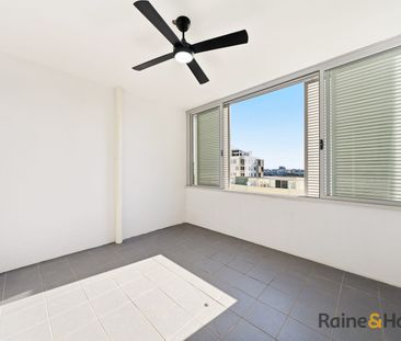 Spacious Dual-Level 2 Bed Apartment with Water Views & Resort-Style... - Photo 5