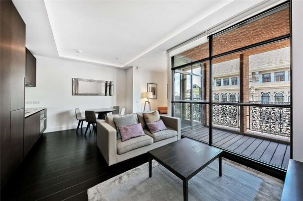 A Lavish 5th floor apartment within a stylish and highly desirable boutique new development. Beautiful open plan reception, large double bedroom and a contemporary bathroom. - Photo 1