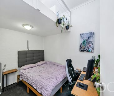 Open the Door to a Stylish Loft Retreat - Photo 4