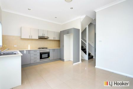 This 5 bedroom townhouse is an absolute must to inspect! - Photo 3