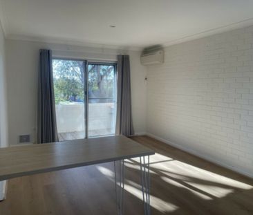 Single Bedroom Top Floor Unit - Photo 1