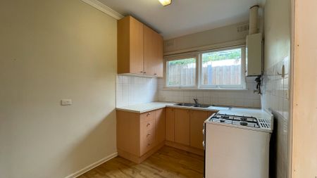 Bright 2-Bedroom Unit with Private Courtyard, Carport & Storeroom - Photo 4