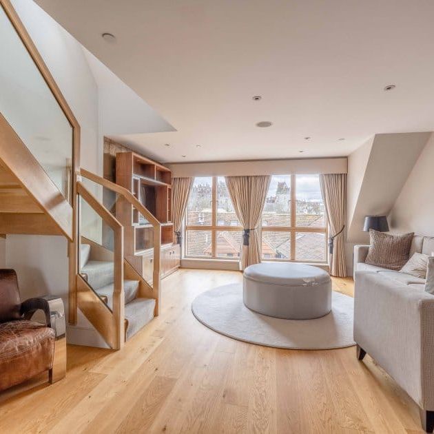 Elevate your lifestyle in this unique residence where modern sophistication meets historic charm. - Photo 1