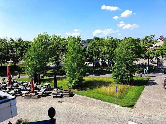 Appartement met 2 slaapkamers, in het rustige Eksaarde, met zicht op het dorpsplein. - Foto 1