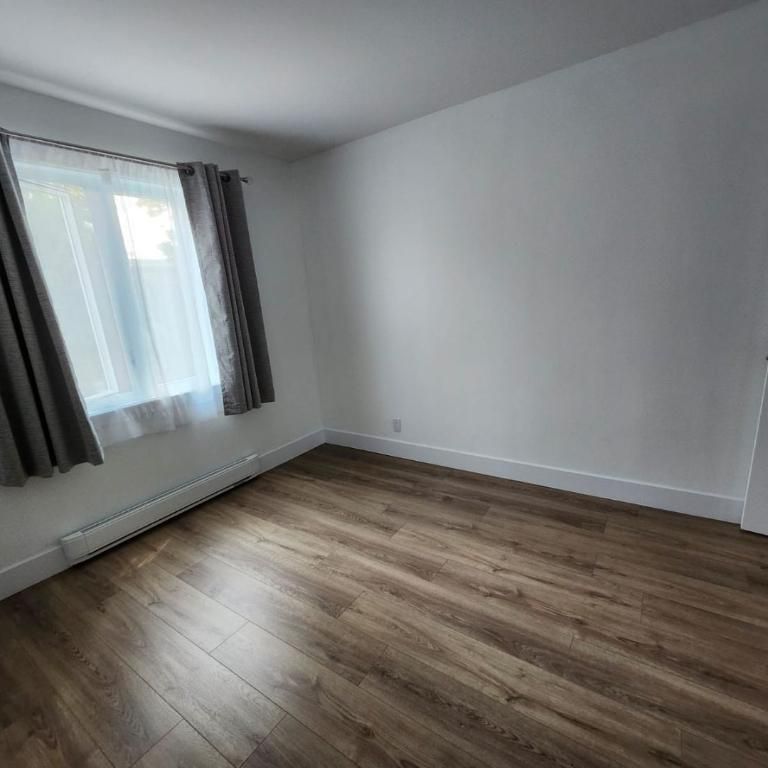 LAVAL PRÈS MÉTRO CARTIER 5 1/2 RÉNOVÉ 1ER ÉTAGE - Photo 1