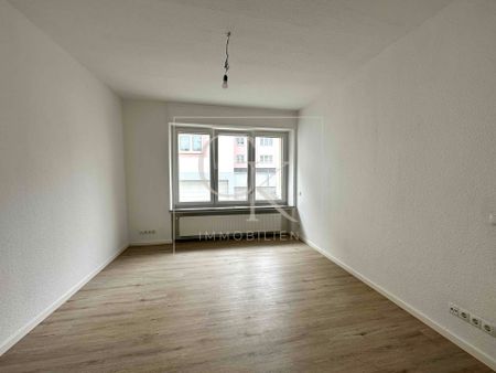 Inmitten der Stadt: 2-Zimmer-Wohnung mit Einbauküche - Photo 4