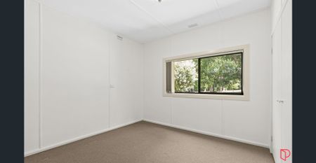 Charming 3-Bedroom Home with Spacious Backyard - Photo 2