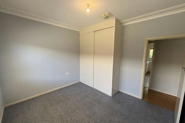 TIDY THREE BEDROOM HOME - Photo 1