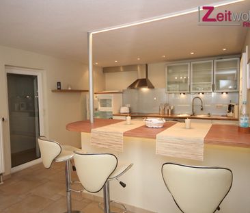 Exklusive möblierte Souterrain-Wohnung mit Terrasse in ruhiger Lage - Photo 1