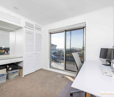 Elevated and renovated - Photo 4