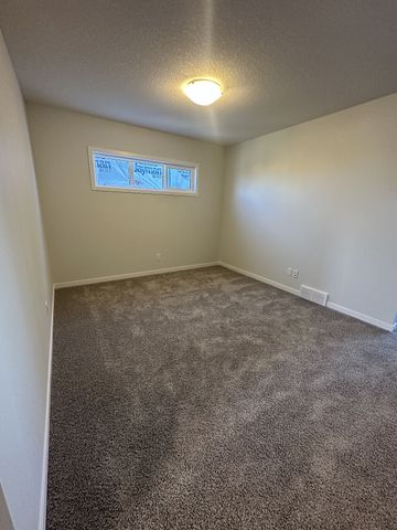 89 Edith Gate NW, Calgary - Photo 4