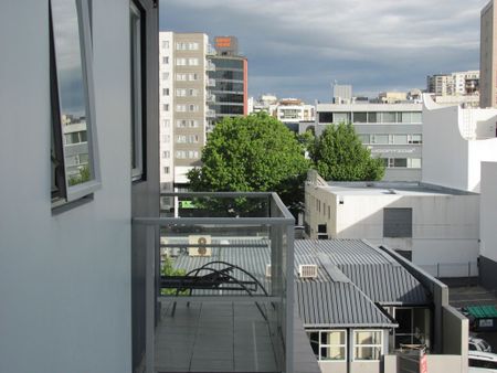 Light and Bright Furnished Corner Apartment with Balcony - Photo 3