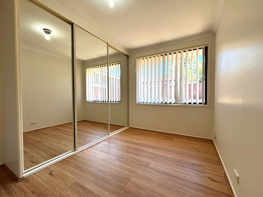 Family Home in Peaceful Edensor Park! - Photo 1