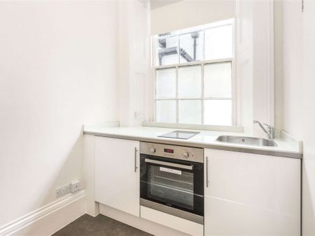 Situated in the desirable location of Cranley Place in the heart of South Kensington, this studio flat has its own kitchenette and shared bathroom facilities. - Photo 3