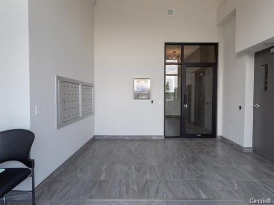 Appartement à louer - Laval (Chomedey) (Place Renaud) - Photo 1