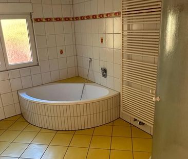 Moderne Dachgeschosswohnung - Foto 1