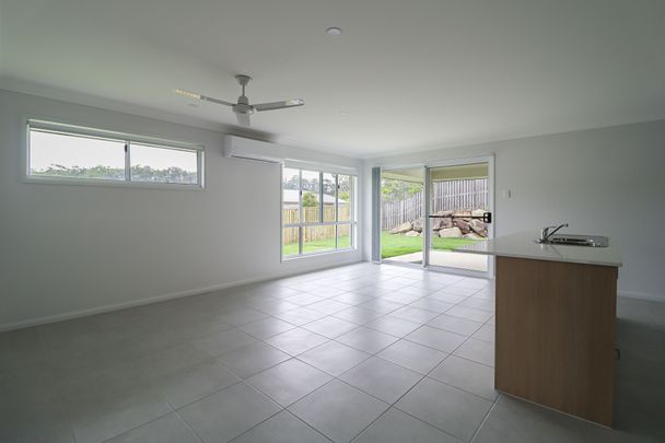 NESTLED ON THE BOYNE RIVER YOUR BRAND NEW ADDRESS AWAITS! - Photo 1