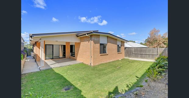 Immaculate Family Home with Versatile Media Room - Photo 1