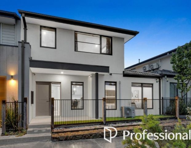 Brand New 4-Bedroom Townhouse - Photo 1