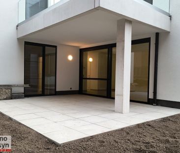 Gelijkvloers nieuwbouwappartement met terras en tuintje - Photo 4