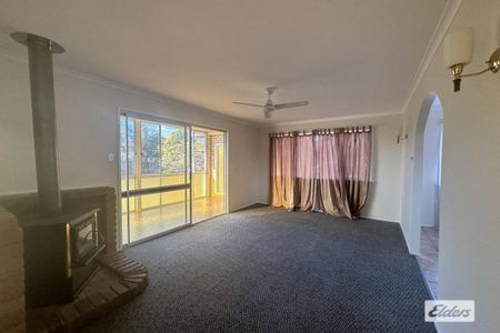 Spacious Home With 2 x Sheds - Photo 5