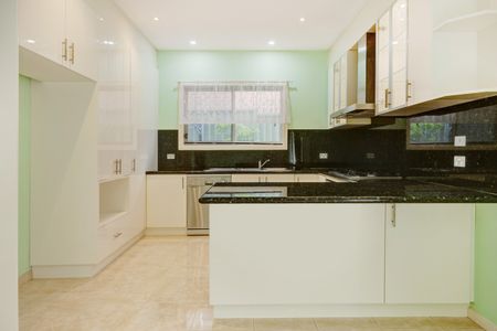 Spacious Double-Storey Townhouse with Modern Comforts - Photo 3