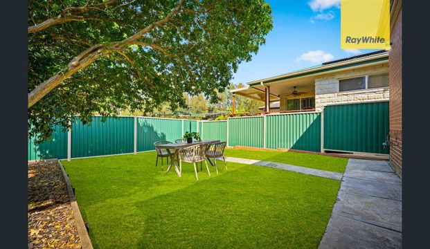 STYLISH BRICK HOME WITH SPACE, COMFORT & LOCATION - Photo 1