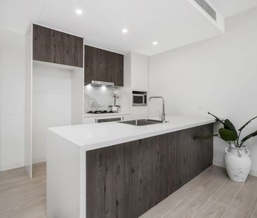 NEAT & TIDY ONE BEDROOM UNIT WITH GYM & ROOFTOP - Photo 1