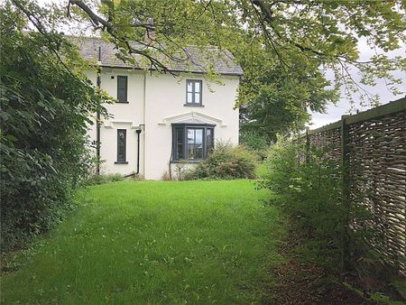 A beautifully presented detached three-bedroom residence, constructed in traditional slate and stone, set within generous landscaped gardens in the highly desirable town of Cockermouth - Photo 3