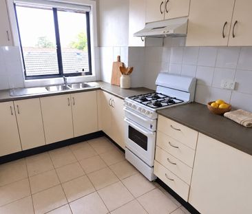 Light-Filled Top Floor Apartment – Walk to Belmore Station & Shops! - Photo 4