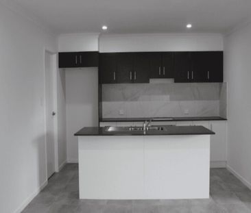Spacious Four-Bedroom Duplex with Everything You Need - Photo 5