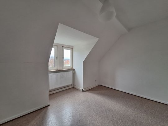 Geräumige Dachgeschosswohnung mit Flair - Foto 1