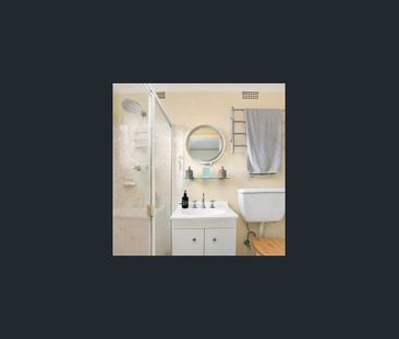 Coastal Gem! Bright 1-Bedroom Apartment with Lock-Up Garage Moments... - Photo 1