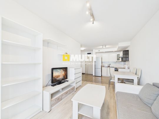 Dwa pokoje z garażem na strzeżonym osiedlu - Zdjęcie 1