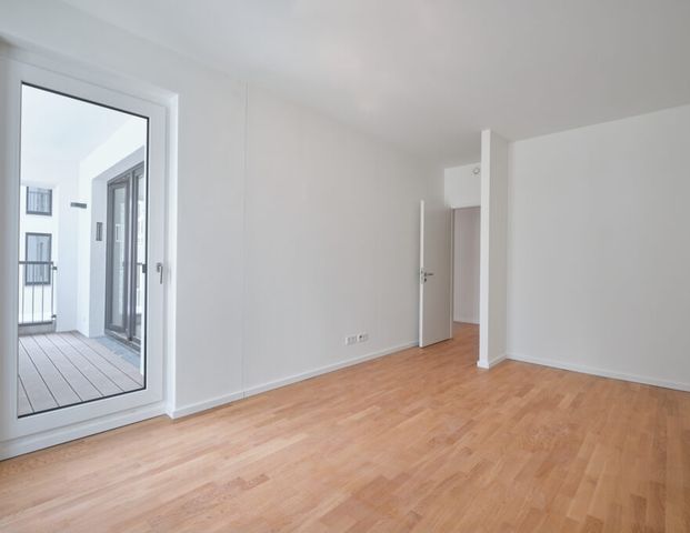 Moderne 2-Zimmerwohnung mit Einbauküche und großzügiger Terrasse. - Photo 1