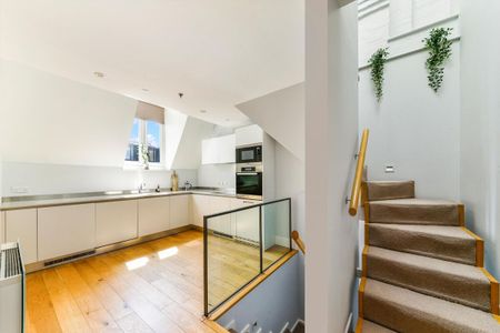 Exceptional duplex apartment within the iconic St Pancras Chambers, offering dramatic ceiling heights, historic character and access to five-star resident services. - Photo 4